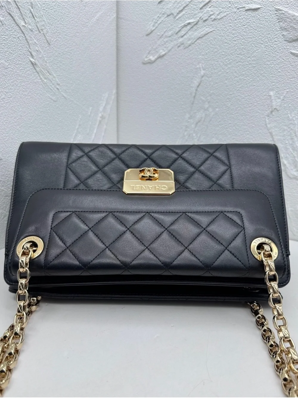 CHANEL Black Quilted Leather Shoulder Bag with Gold Hardware